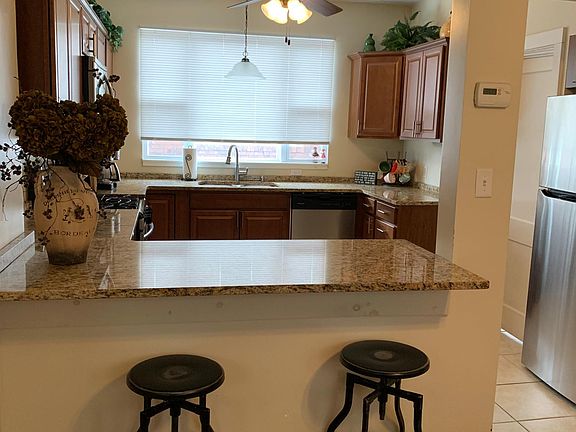 Granite bar area open to dining room