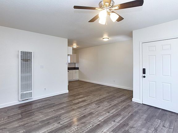 livingroom, dining nook and kitchen as seen from livingroom