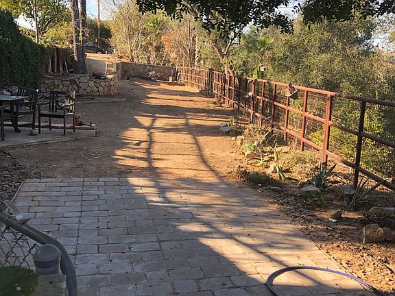 Large front yard, fully fenced, ~1,600 sqft