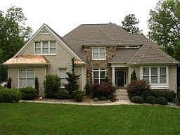 This Governors Club estate home provides a private setting with 5 Bed/5.5 Bath