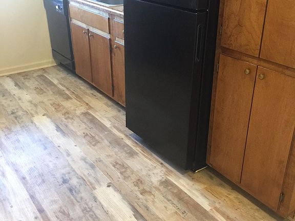 Brand new Black Appliances with luxury vinyl.