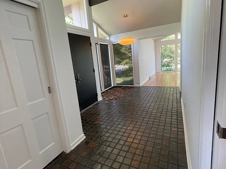 Entry way with large coat closet