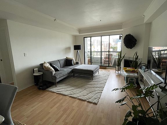 Living/family room with private balcony and wood burning fireplace!