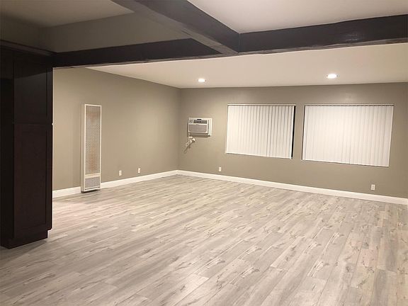 Living room w/ open floor plan.