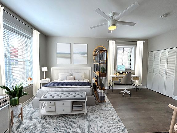 Studio apartment has large windows providing fantastic natural light 
modern ceiling fan 
A/C & heating unit included