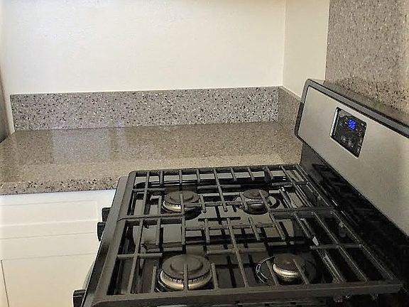 Punahou Heights kitchen area with gas stove and counters