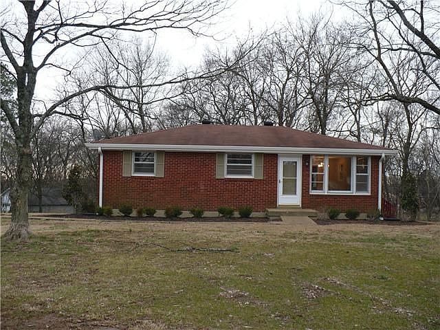 4 sides Brick .96 acre corner lot!