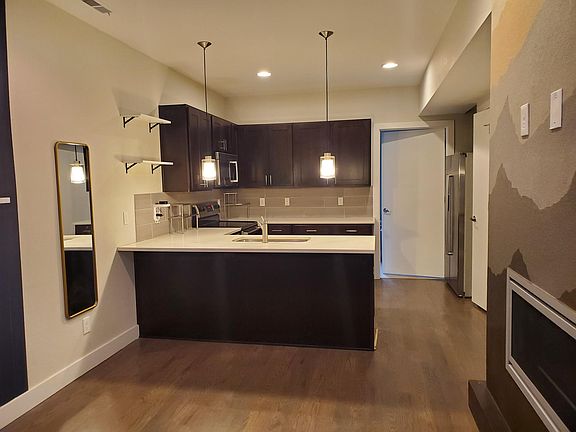 First floor - living room, kitchen, full bath and laundry