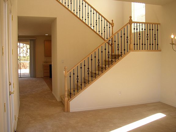 Wrought Iron & Maple Stairway