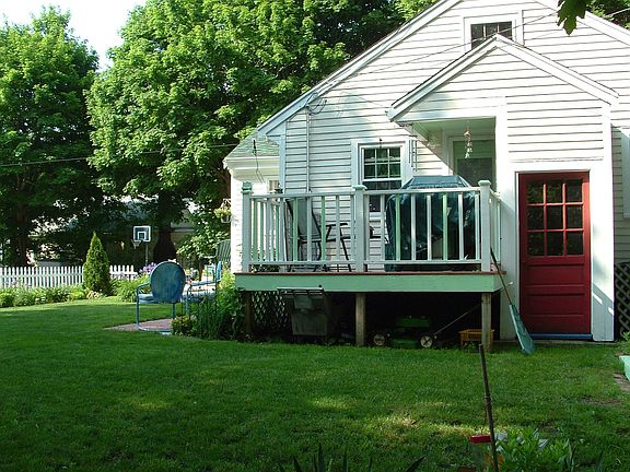 deck on side, full basement access