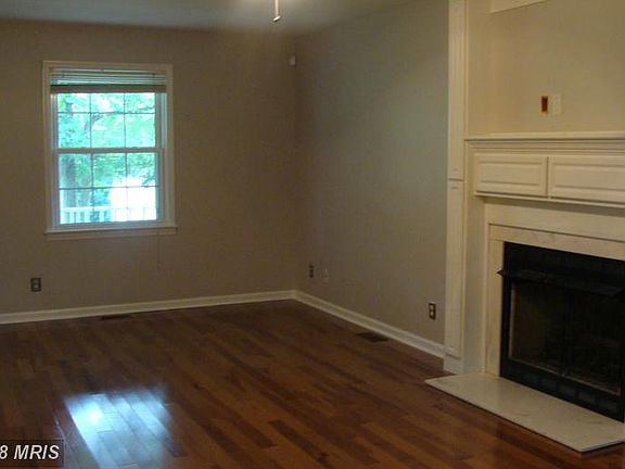Living Room with wood floors and gas fireplace