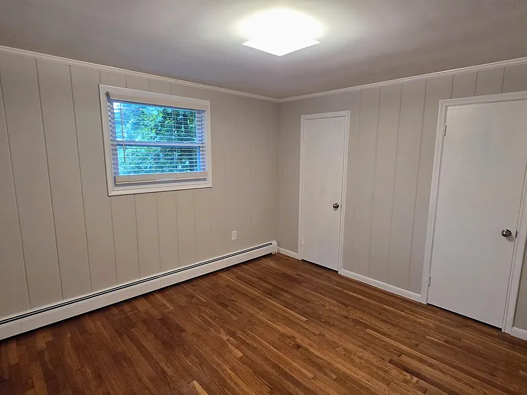 a large closet in the bedroom (two white doors)