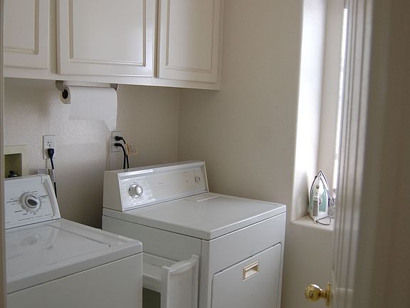 Laundry room includes washer/dryer