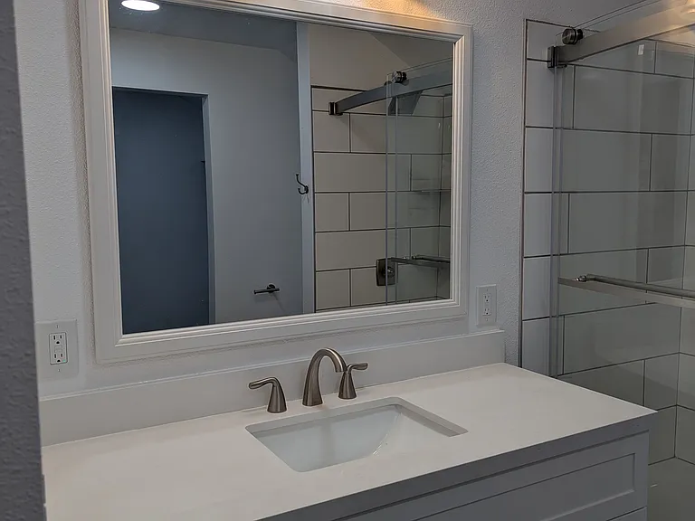 Plenty of room in the Master bath, large vanity for counter space.