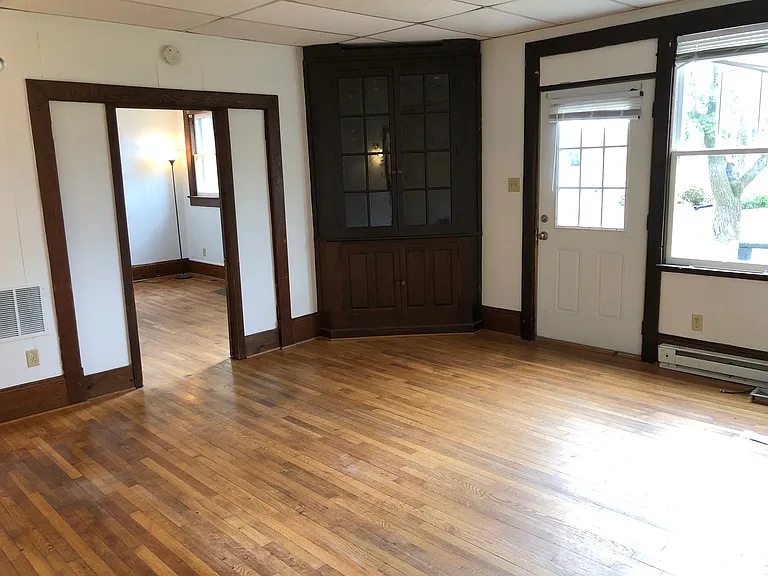 Living Room and main entrance, entrance to 1st Bedroom.