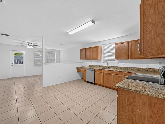 5th image of 8417 Redheart St