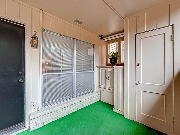 Front patio with ample room for a table and chairs and BBQ station. Built-ins and storage closet