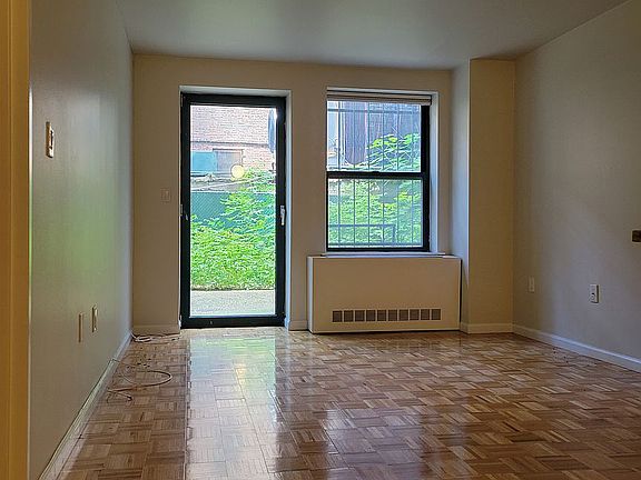 2nd image of 225 E 6th St APT 1L