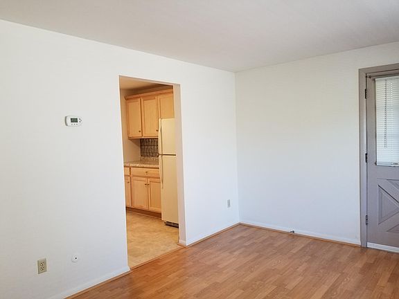 Front room with view into kitchen.