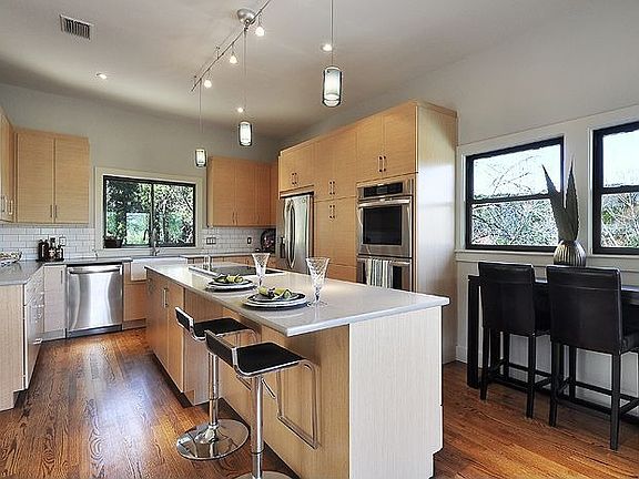 Gourmet Kitchen with CaesarStone countertops, energy-efficient and all stainle