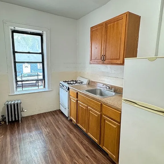 89-32 138th Pl #3 — Photo 1