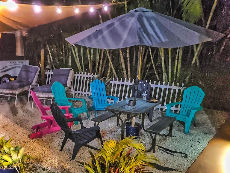 Relaxing shaded BBQ area with grill