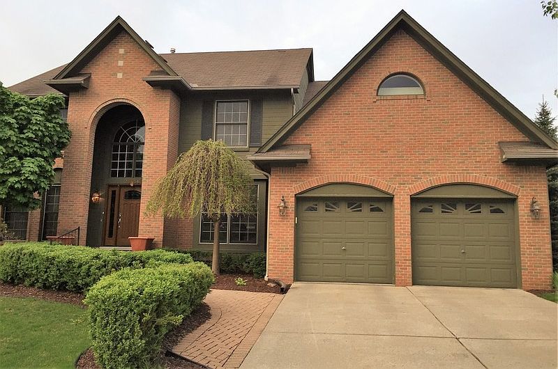Brick colonial with 2 car garage