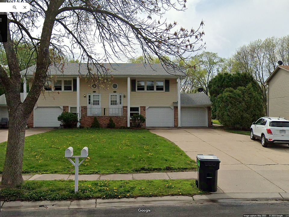 Large 2 car attached garage plus additional parking
