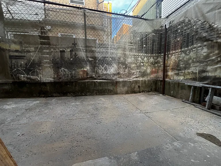 Private rear concrete patio directly off the kitchen_perfect for outdoor seating or grilling