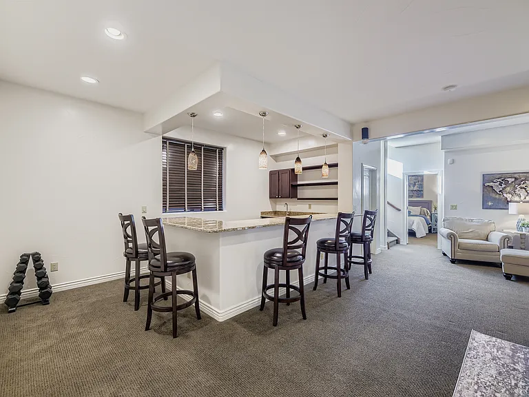 BASEMENT BAR WITH SINK AND MINI FRIDGE