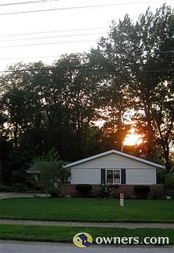 Front of home, beautiful trees