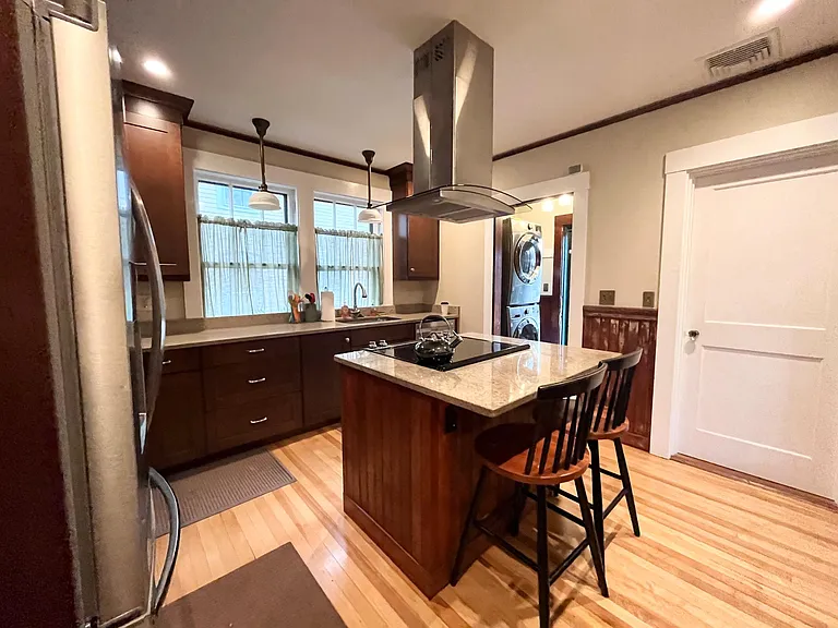 Kitchen with full size washer/dryer off the kitchen.