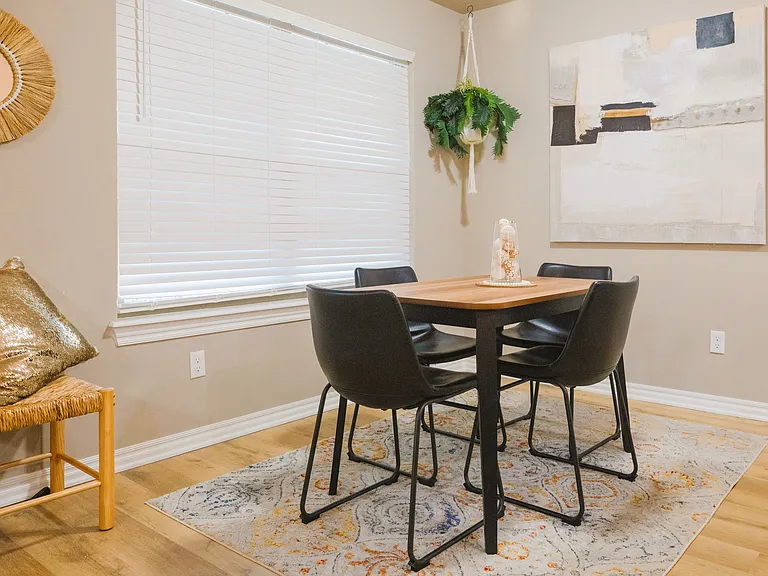 Kitchen table. Extra seating at bar.