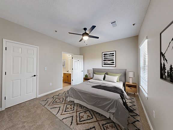 Cozy bedroom with ensuite bathroom.