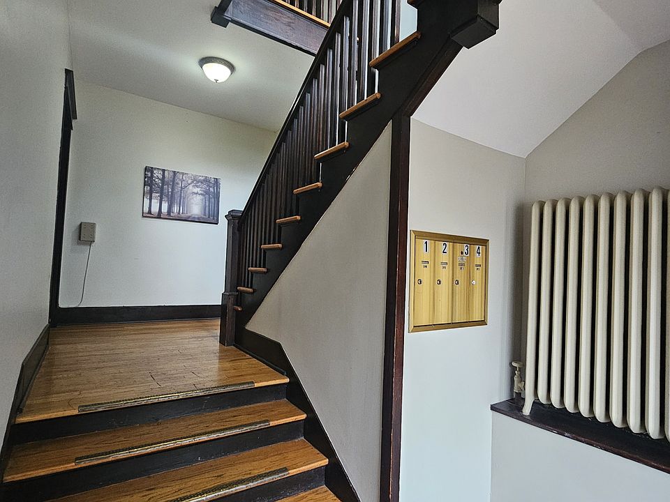 Entrance hall, mail, and stairs