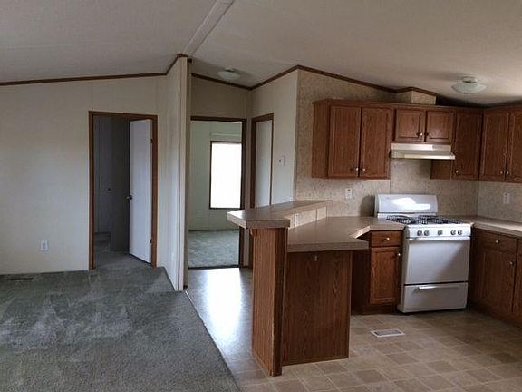 Kitchen/Living Room & entrances to 2nd Bdrm, Office, and Bathroom