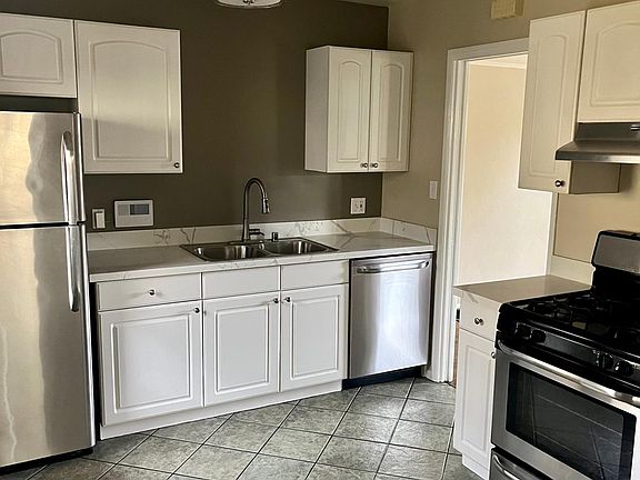 Newer kitchen includes a dishwasher