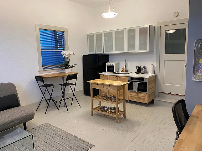 Kitchenette with Island and Dining Counter with stools
