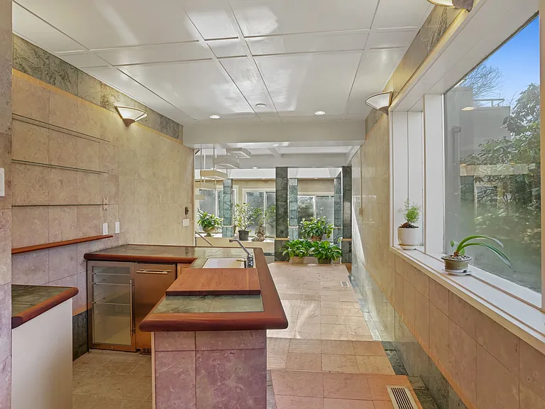 Entrance to the Indoor Pool features this Bar with a new ice maker.