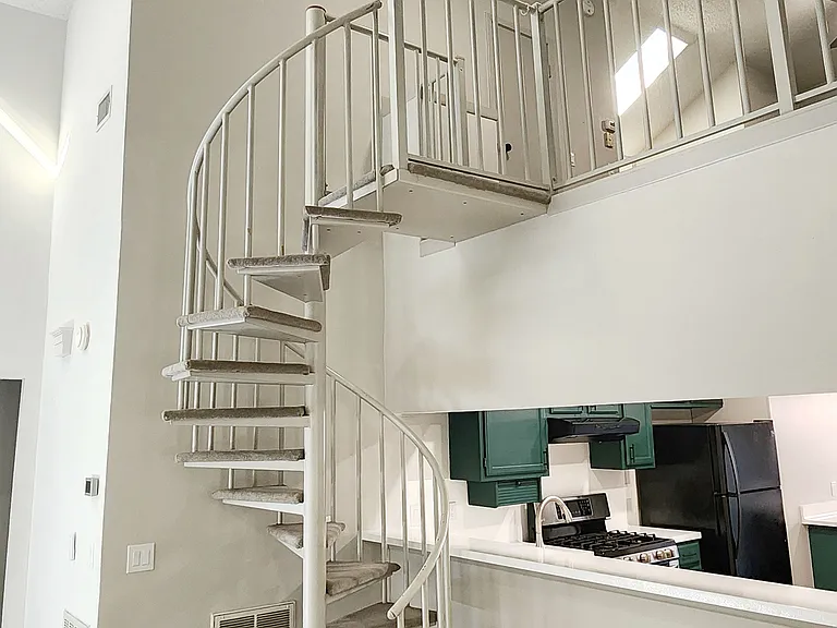 Spiral staircase to upstairs loft