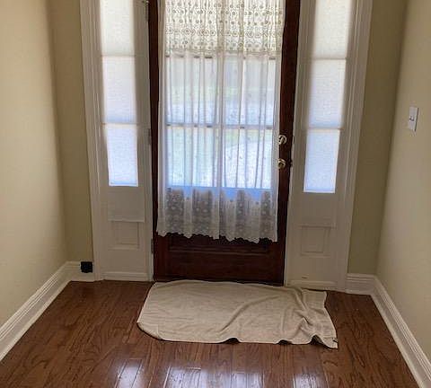 Front Door Entrance into a Large Foyer