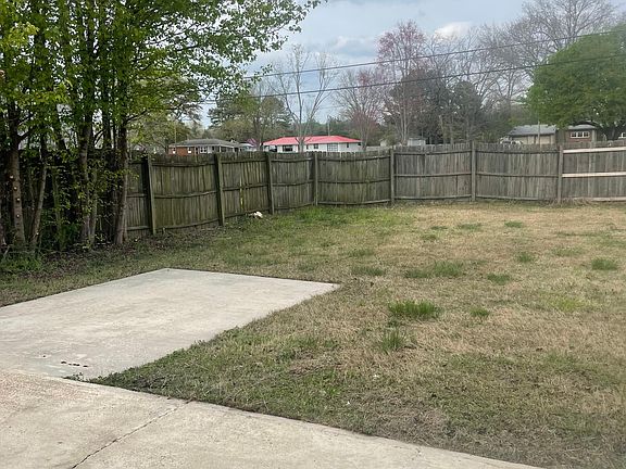 Large, fenced backyard with large patio. (Section of fence will be repaired before move in).