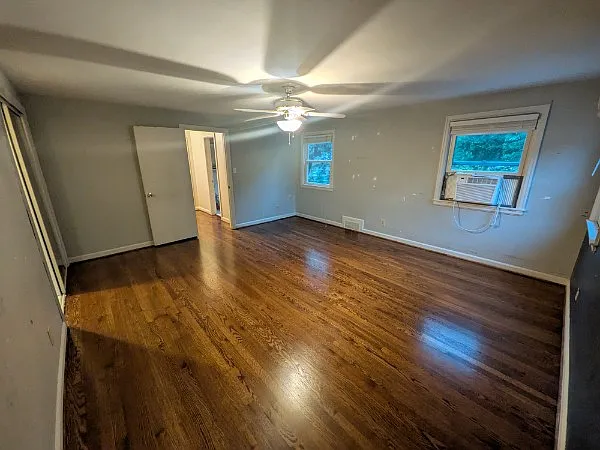 Larger bedroom (west) on 2nd floor (looking back toward hallway.