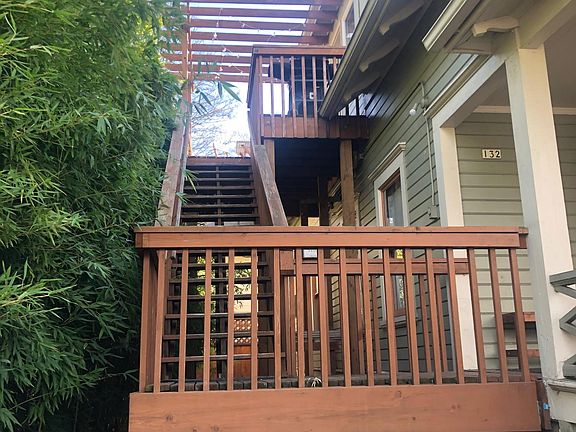 Bamboo lines the stairs going up to the unit which creates a beautiful privacy screen.