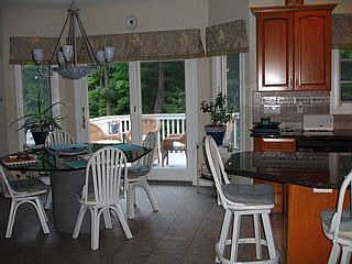 SPACIOUS MODERN KITCHEN WITH ALL TOP OF THE LINE APPLIANCES INCLUDED WITH SALE