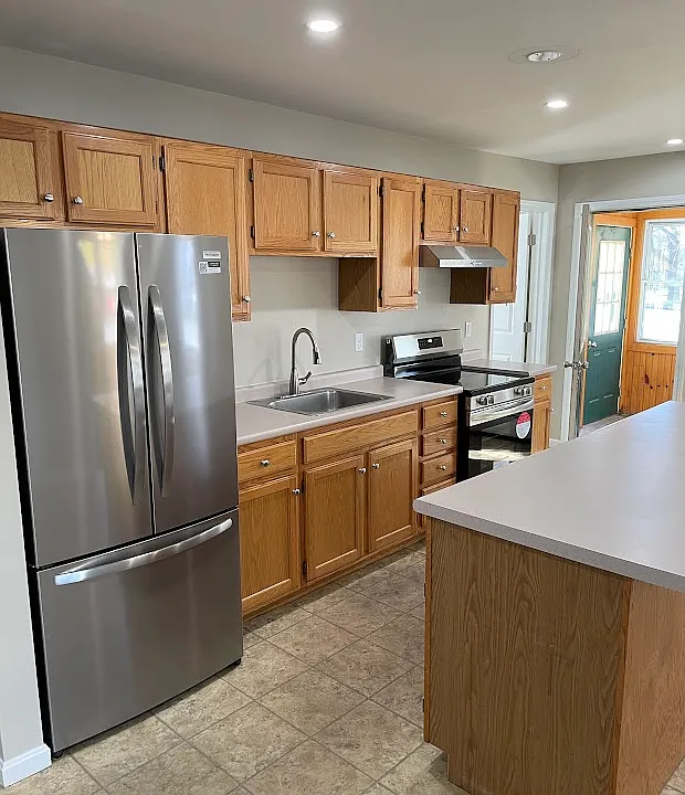 Large eat-in kitchen with brand new appliances and recessed lighting