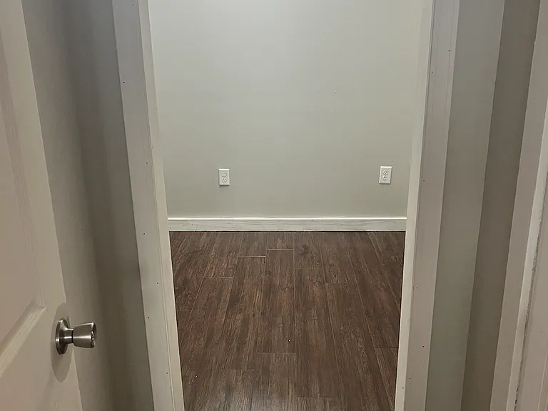 Petite hallway to bedroom with large closet