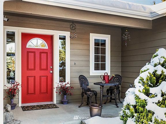 A beautiful front porch for sitting and enjoying the sunrise. 