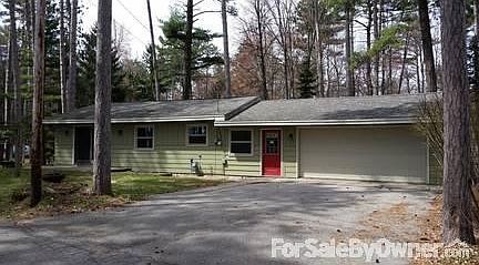 Front : 2 car attached garage with extra wide driveway