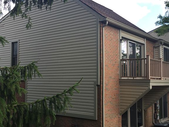 Side exterior w/ balcony